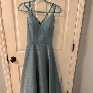 Long formal/prom dress with pockets. Lace up back. Never worn.
